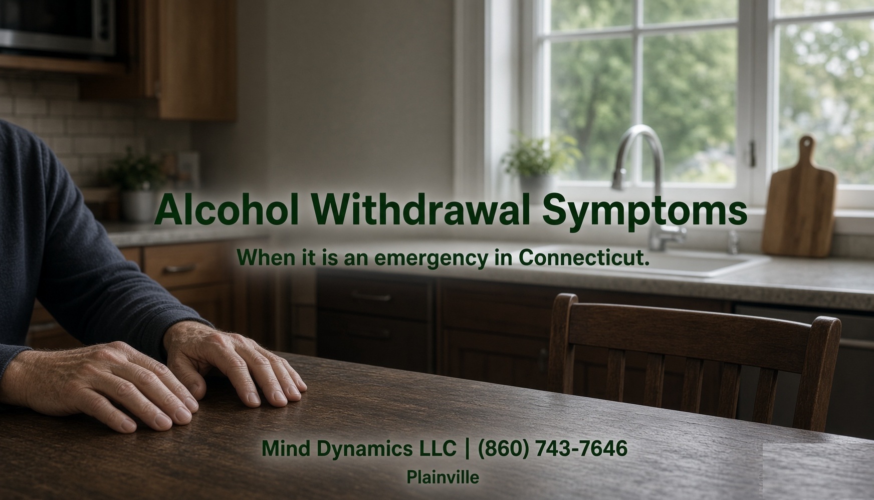 Early morning kitchen table in a Connecticut home, soft window light, empty chair, hands resting on the table, title overlay Alcohol Withdrawal Symptoms.